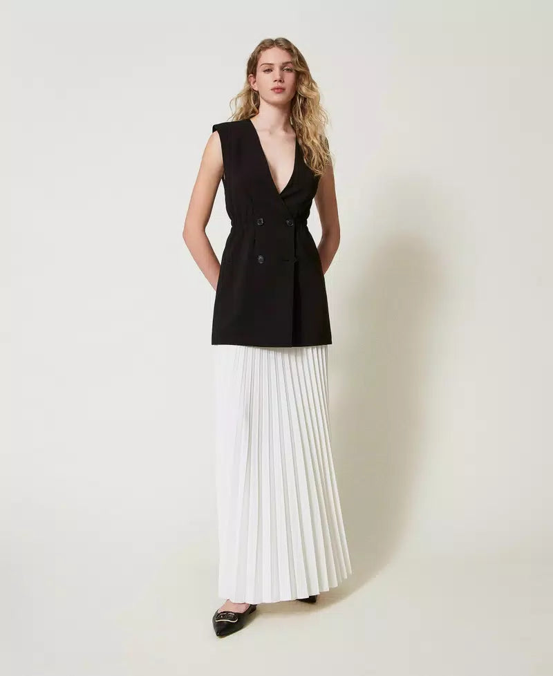 Crêpe gilet and long pleated skirt