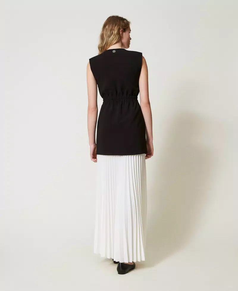 Crêpe gilet and long pleated skirt