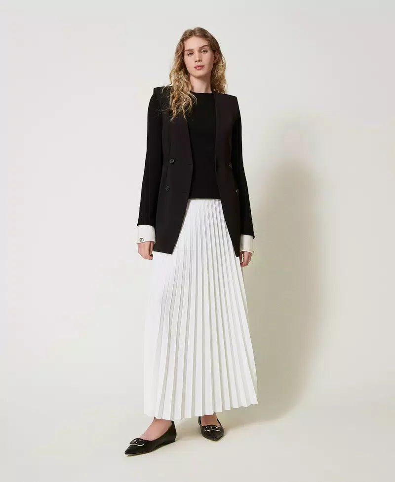 Crêpe gilet and long pleated skirt